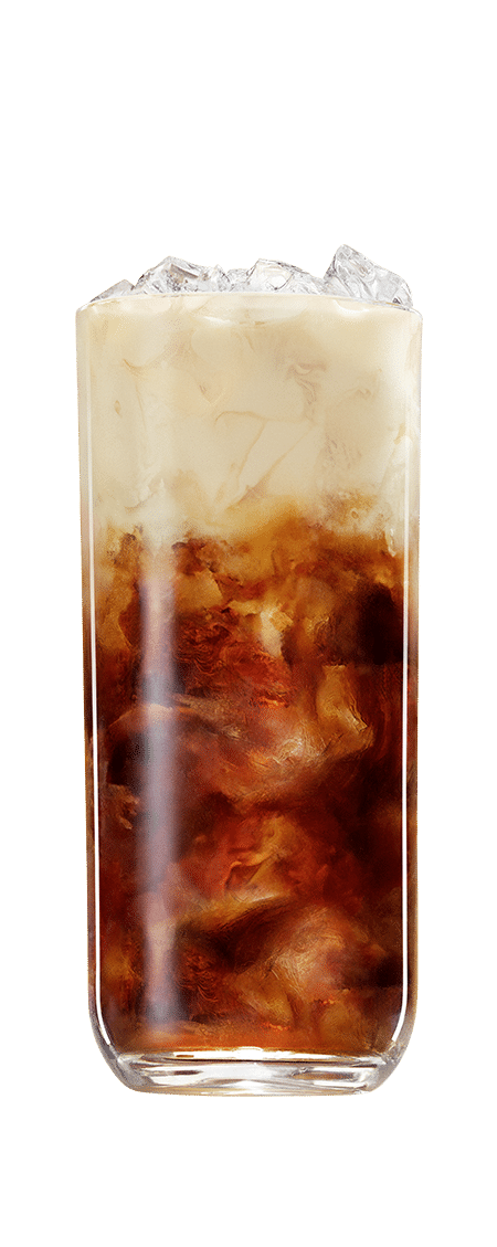 Kahlúa iced coffee with milk and ice in front of a transparent background
