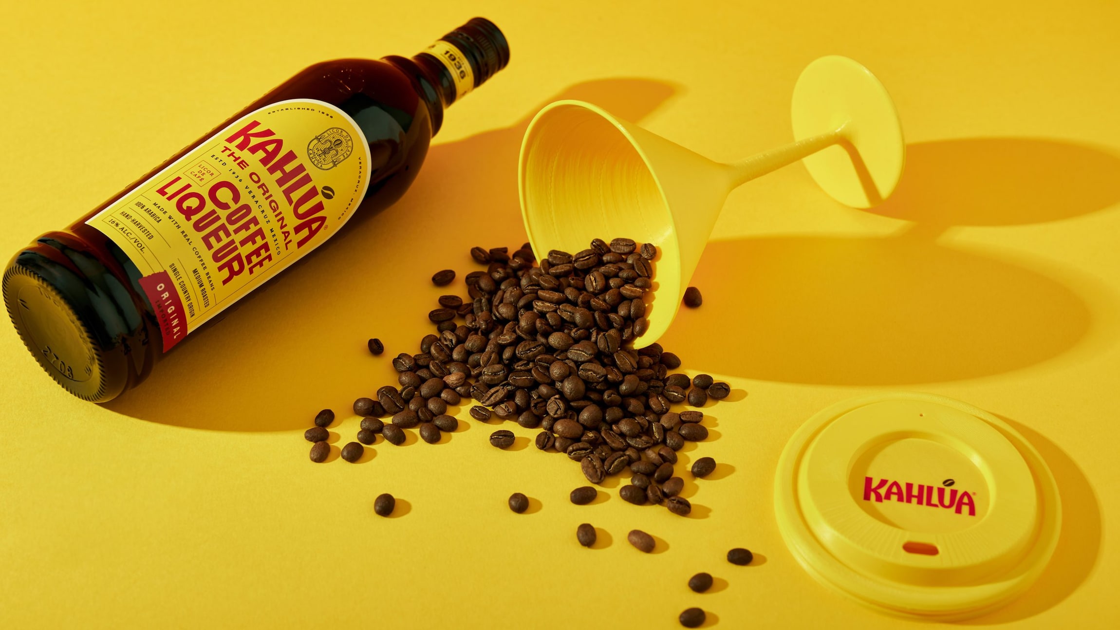 Kahlua espresso martini cocktail to go cup  with a bottle of Kahlua original