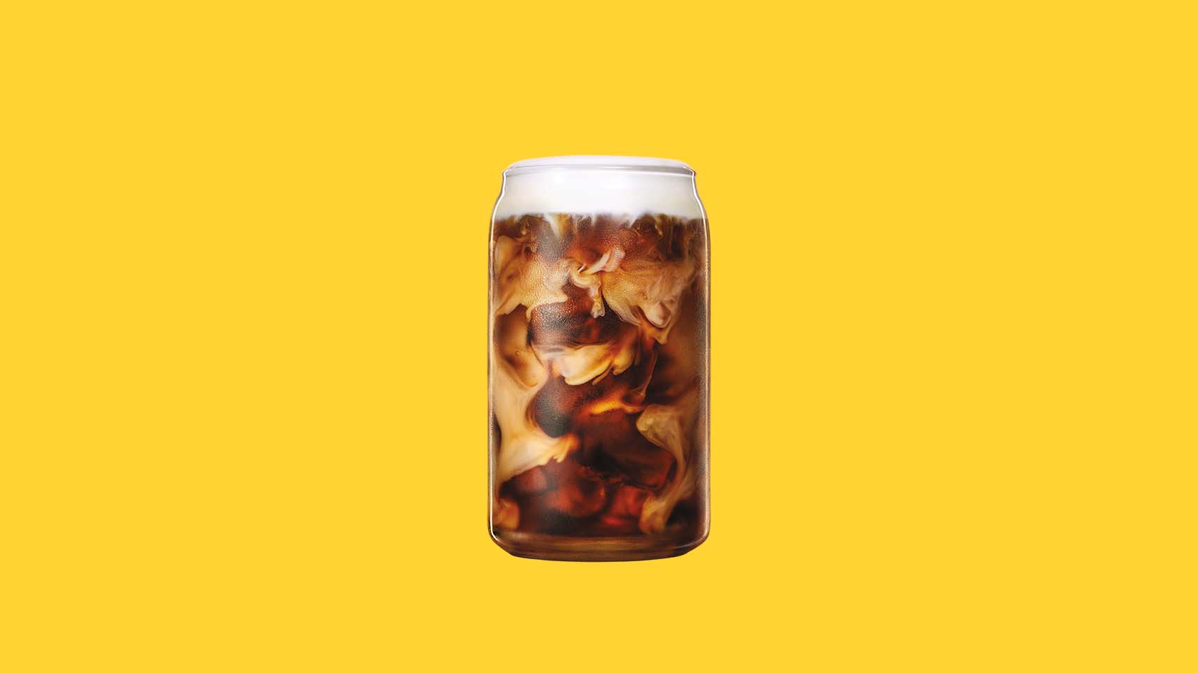 Kahlua-Dunkin-Cold-Brew placed in front of a yellow background